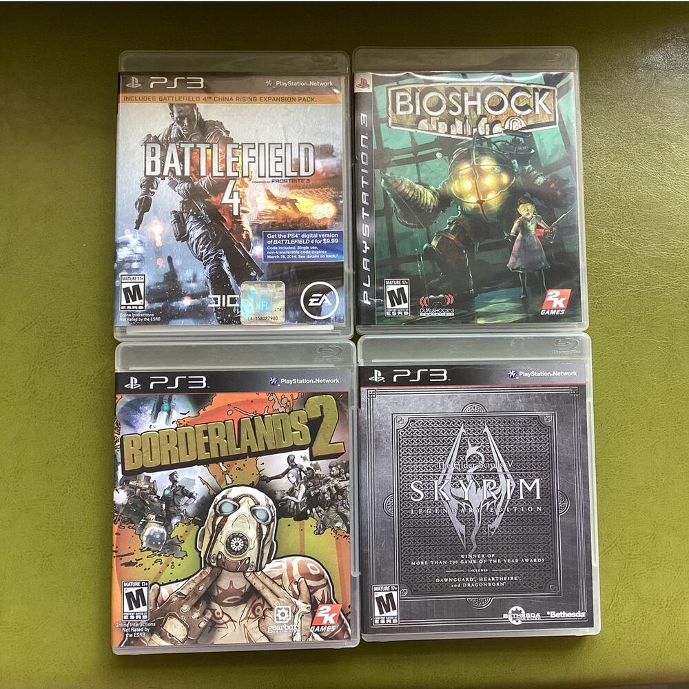 Playstation 3 Lot of 4 Games Skyrim Borderlands 2 Bioshock Battelfield 4